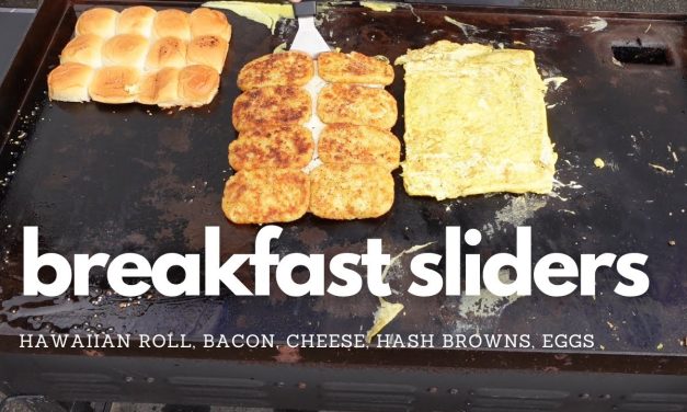 Breakfast Sliders with bacon, cheese, hash browns, eggs and topped with everything bagel!